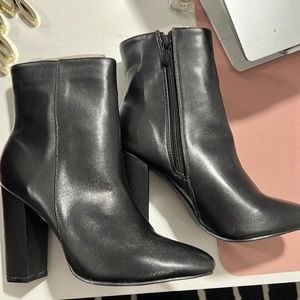 - Black leather boots